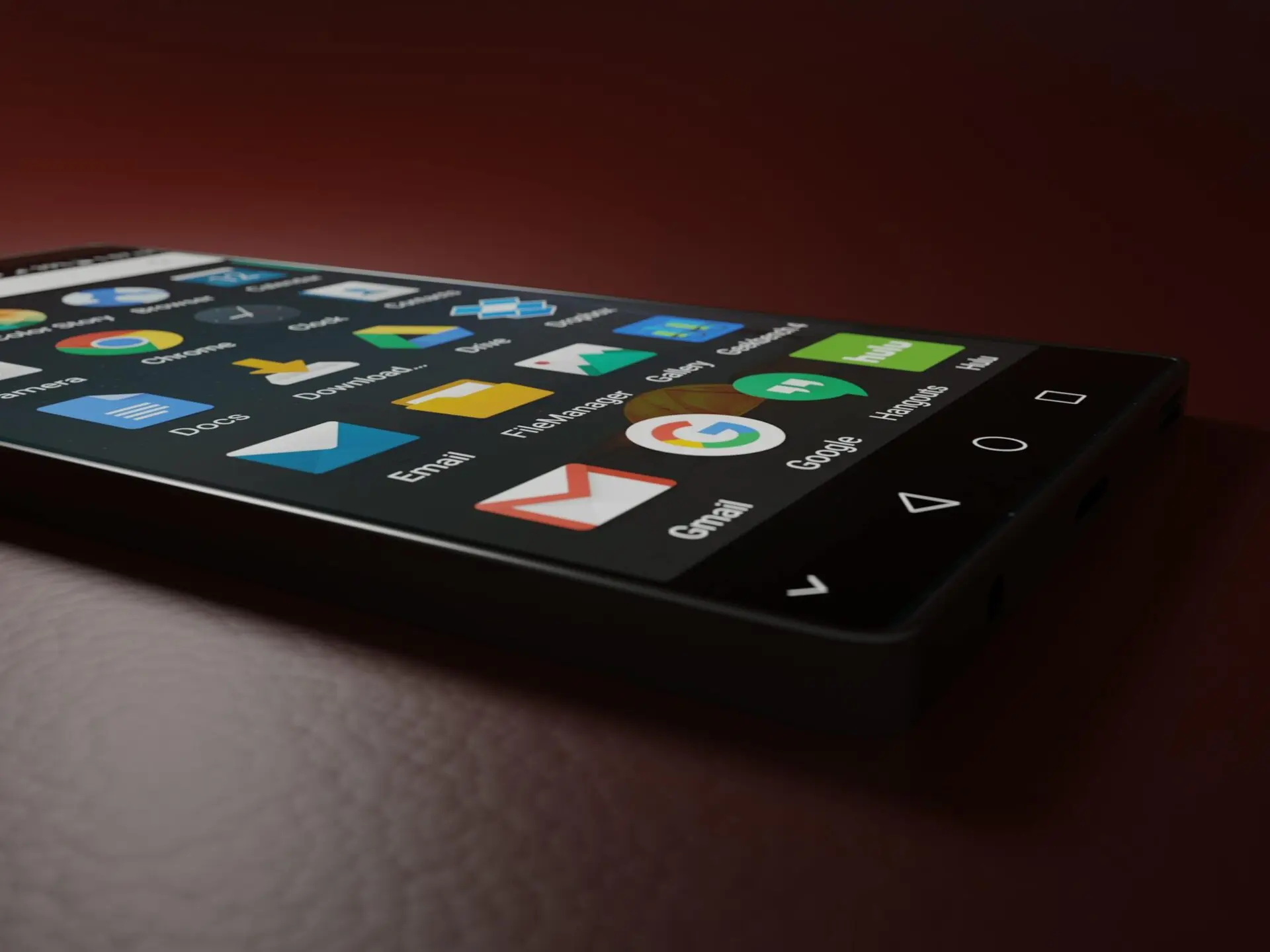 5 Smart Strategies to Drive ROI with CRM Users Email List in Account-Based Marketing 1 Close-up of a smartphone displaying various app icons in a low-light setting.