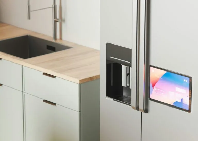 a kitchen with a sink and refrigertor